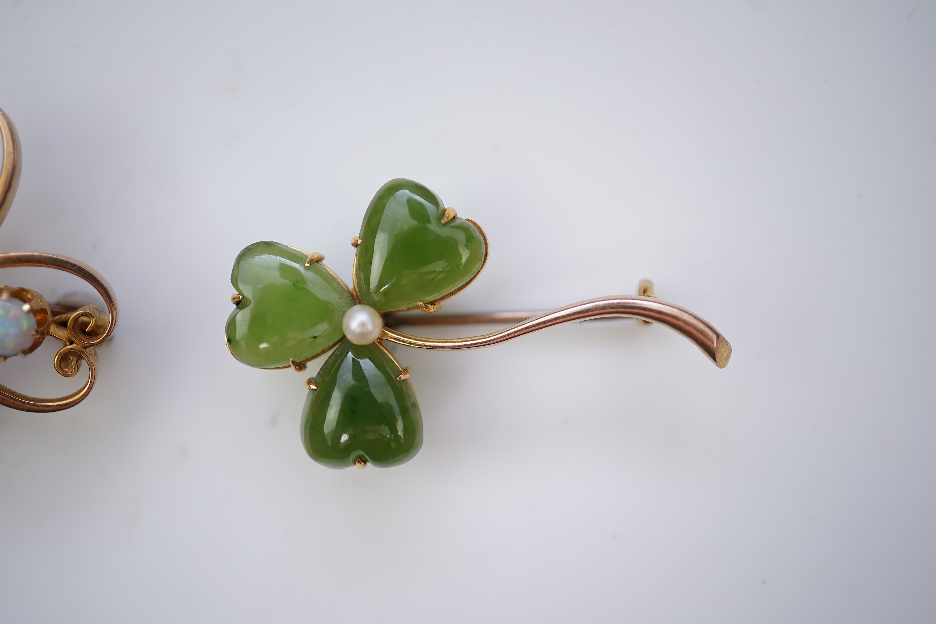 Two gem-set brooches
